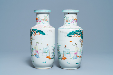 A pair of Chinese famille rose rouleau vases with immortals, 19/20th C.