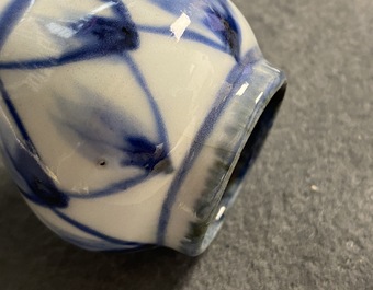 A pair of Chinese blue and white garlic-mouth bottle vases, Wanli