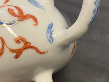 A Chinese blue, white, iron red and gilt tripod teapot and cover, Kangxi