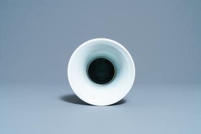 A Chinese blue and white 'gu' vase with immortals, Kangxi