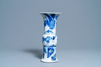 A Chinese blue and white 'gu' vase with figurative design, Kangxi
