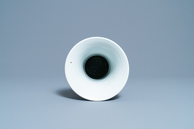 A Chinese blue and white 'gu' vase with figurative design, Kangxi