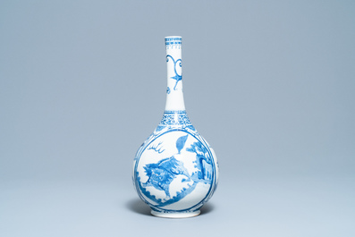 A Chinese blue and white 'qilin' bottle vase, 19th C.