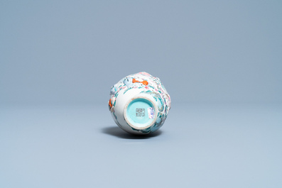 A Chinese famille rose relief-molded 'immortals' vase, Qianlong mark, 19th C.