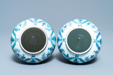 A pair of rare Chinese export porcelain urns and covers, Qianlong