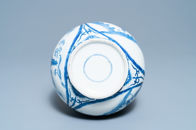 A Chinese blue and white 'qilin' bottle vase, 19th C.