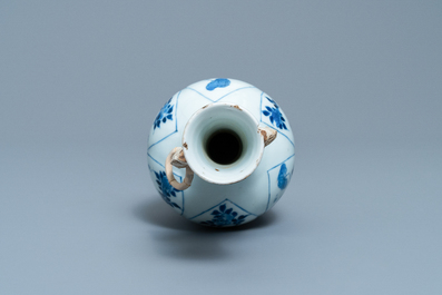 A Chinese blue and white vase with elephant-head handles, Chenghua mark, Kangxi