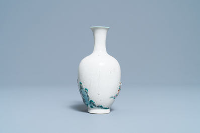 A Chinese famille rose relief-molded 'immortals' vase, Qianlong mark, 19th C.