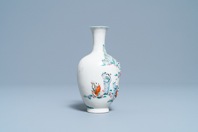 A Chinese famille rose relief-molded 'immortals' vase, Qianlong mark, 19th C.