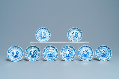 A collection of Chinese blue and white cups and saucers, 19th C.
