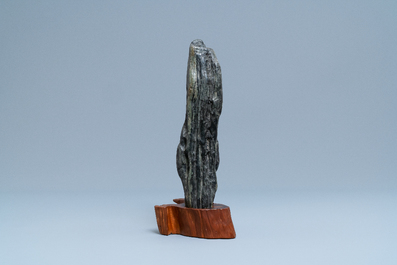A Chinese scholar's dream stone on wooden stand, 19th C.