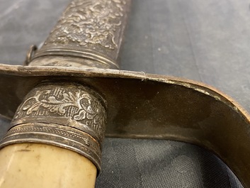 A Chinese or Vietnamese silver, tie li mu wood and bone sword, 19th C.