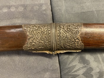 A Chinese or Vietnamese silver, tie li mu wood and bone sword, 19th C.