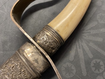 A Chinese or Vietnamese silver, tie li mu wood and bone sword, 19th C.