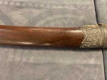 A Chinese or Vietnamese silver, tie li mu wood and bone sword, 19th C.