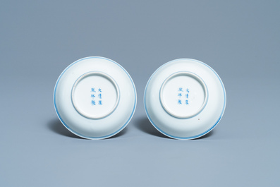 A pair of Chinese blue and white 'dragon' saucers, Kangxi mark, 19th C.
