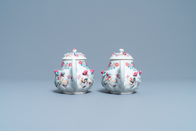 A pair of Chinese famille rose relief-decorated teapots and covers, Yongzheng