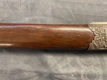 A Chinese or Vietnamese silver, tie li mu wood and bone sword, 19th C.