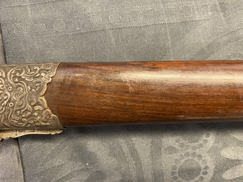 A Chinese or Vietnamese silver, tie li mu wood and bone sword, 19th C.