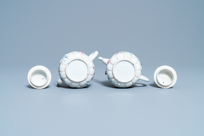 A pair of Chinese famille rose relief-decorated teapots and covers, Yongzheng