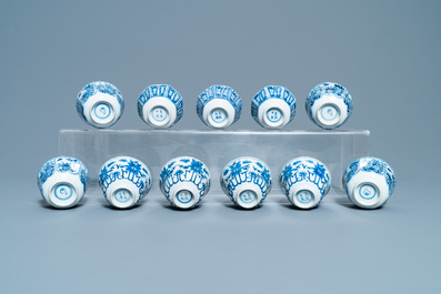 A collection of Chinese blue and white cups and saucers, 19th C.