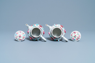 A pair of Chinese famille rose relief-decorated teapots and covers, Yongzheng