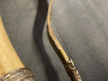 A Chinese or Vietnamese silver, tie li mu wood and bone sword, 19th C.