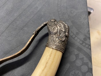 A Chinese or Vietnamese silver, tie li mu wood and bone sword, 19th C.