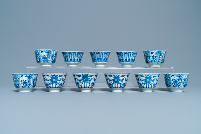 A collection of Chinese blue and white cups and saucers, 19th C.