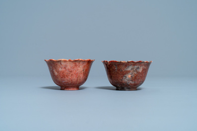 A pair of Chinese Shoushan soapstone gilt-decorated engraved cups and saucers, Kangxi