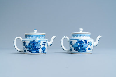 A pair of Chinese blue and white 'antiquities' teapots, Kangxi