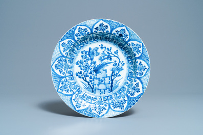 A pair of Chinese blue and white 'pheasant' chargers, Kangxi
