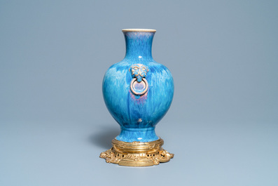 A Chinese gilt bronze-mounted flamb&eacute;-glazed vase, 18/19th C.