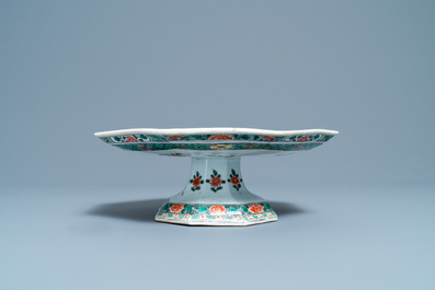 A Chinese octagonal famille verte tazza, Kangxi