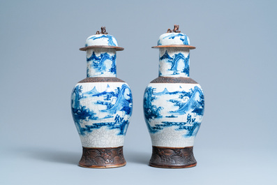 Five Chinese blue and white and famille rose vases, 19th C.