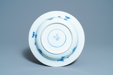 A pair of Chinese blue and white 'pheasant' chargers, Kangxi