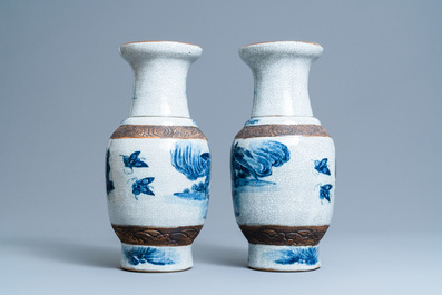 A pair of Chinese blue and white Nanking crackle-glazed vases, 19th C.