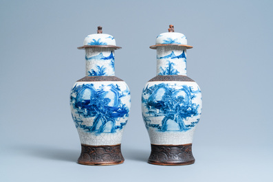 Five Chinese blue and white and famille rose vases, 19th C.
