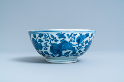 A Chinese blue and white 'Buddhist lion' bowl, Chenghua mark, Jiajing/Wanli
