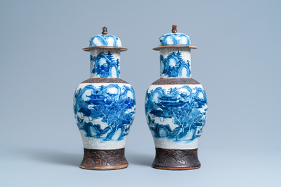 Five Chinese blue and white and famille rose vases, 19th C.