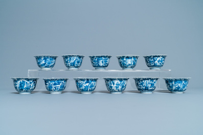 Eleven Chinese blue and white lobed cups and saucers, Kangxi