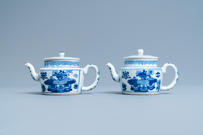 A pair of Chinese blue and white 'antiquities' teapots, Kangxi