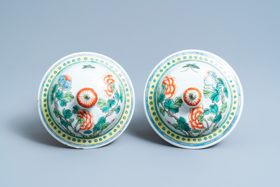 A pair of Chinese famille verte 'dragon' vases and covers, 19th C.