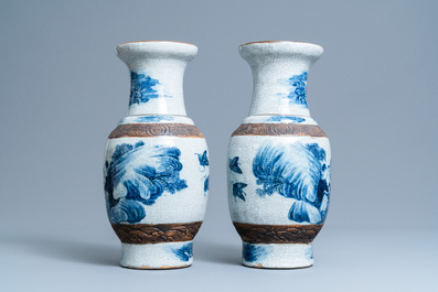 A pair of Chinese blue and white Nanking crackle-glazed vases, 19th C.