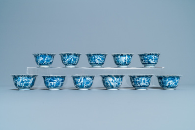 Eleven Chinese blue and white lobed cups and saucers, Kangxi
