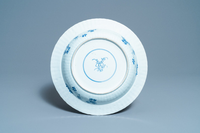 A pair of Chinese blue and white 'pheasant' chargers, Kangxi