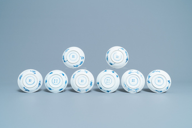 Six Chinese blue and white cups and eight saucers with horseriders, Kangxi