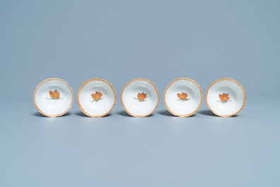 Five Chinese iron red and gilt cups and saucers, Yongzheng/Qianlong
