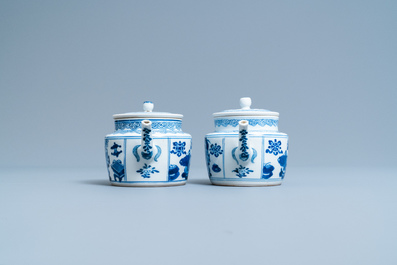 A pair of Chinese blue and white 'antiquities' teapots, Kangxi
