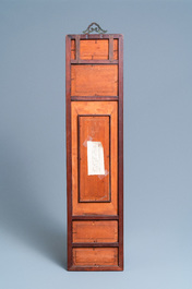 A Chinese carved wooden panel with landscape plaques, 19/20th C.